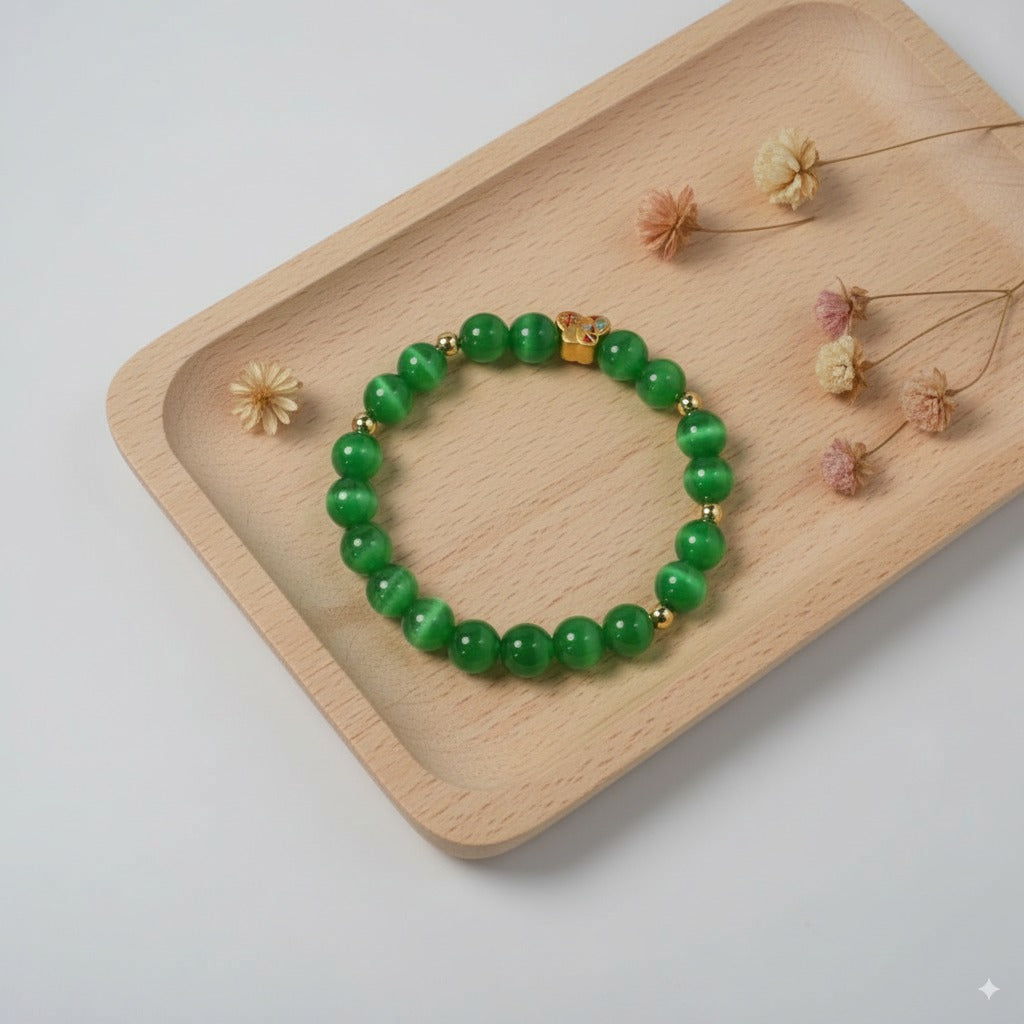 Green cat's eye stone & Colored enamel